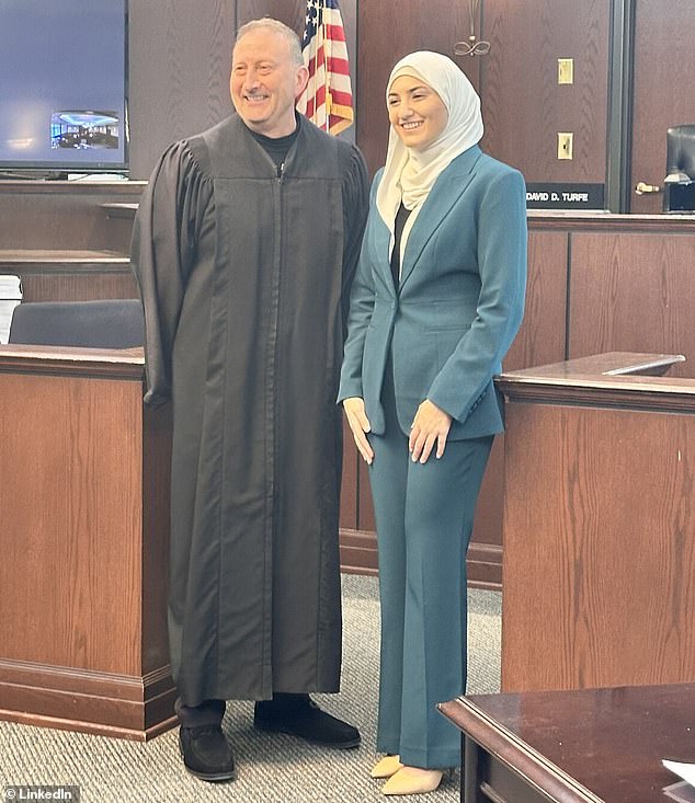 In September of 2021, Hashwi began her studies at the university's law school - completing the program in May 2024, when she was officially sworn in as an attorney (pictured)